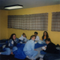 female students on mattresses 