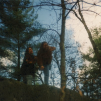 two students in the woods