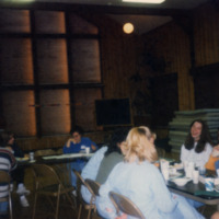 students eating in lodge
